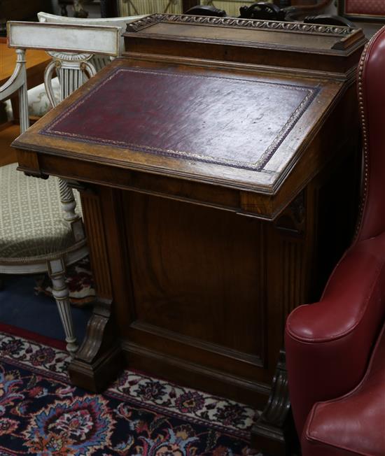 A late Victorian oak Davenport W.64cm